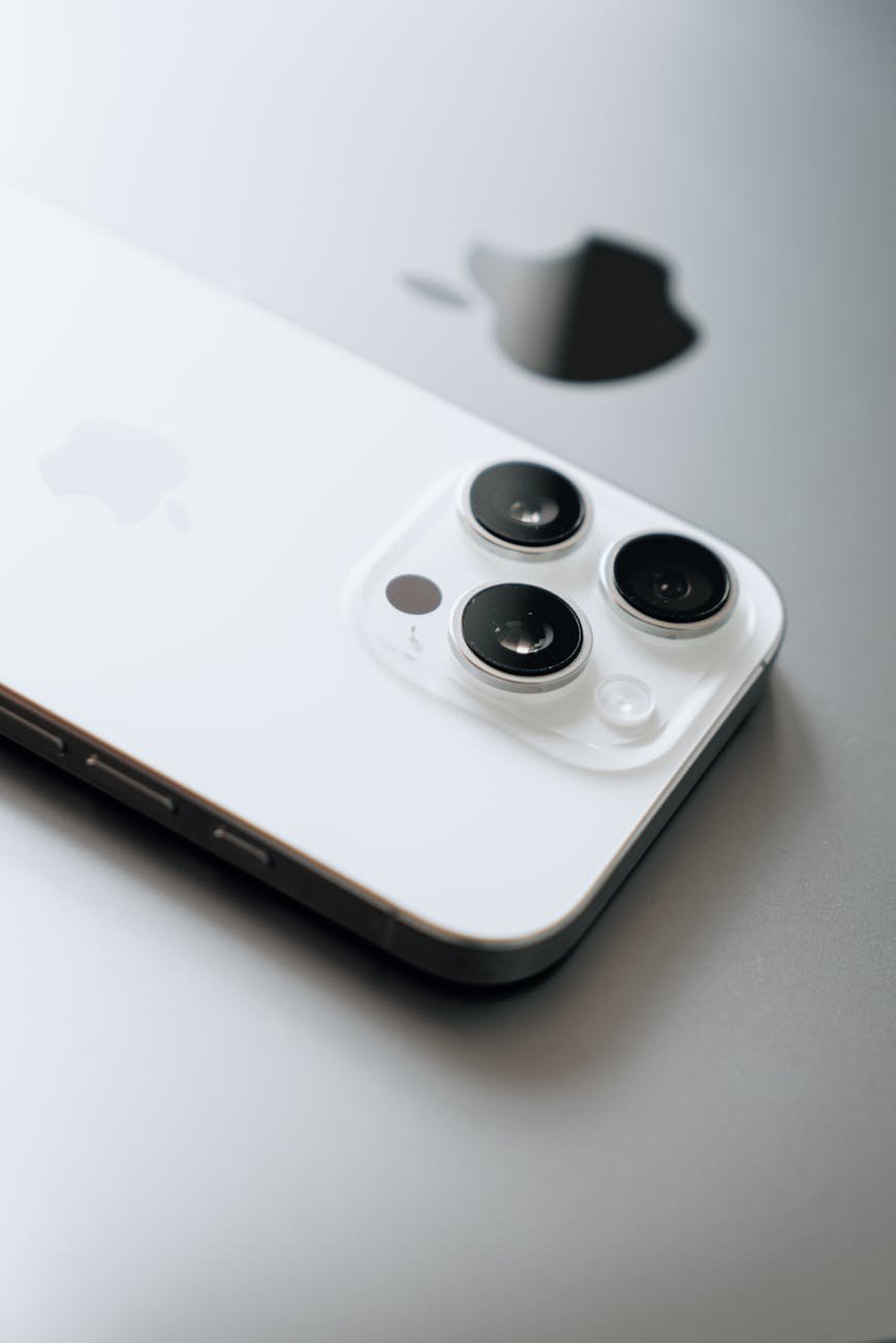 close up of modern smartphone and laptop